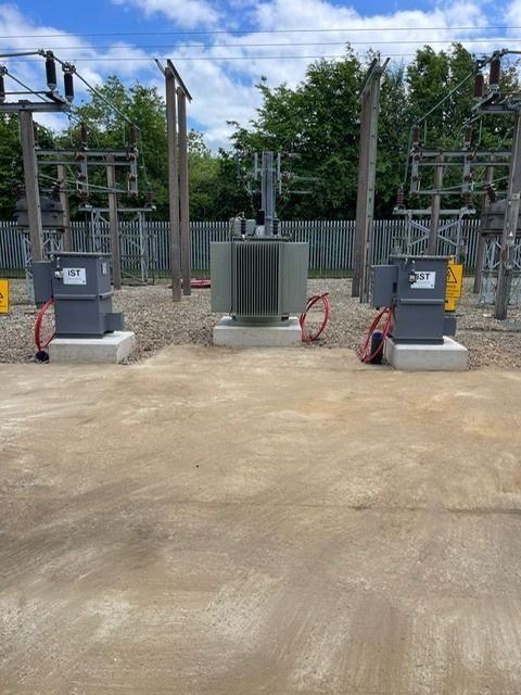 Transformer bund — oil containment shingle layer
